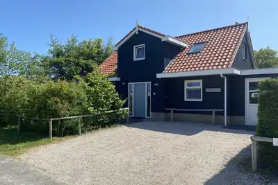 Image de Two luxury holiday homes near the golf course, the village Hollum and nature.