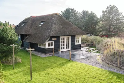Image de Tureluur is a lovely house in the dune area between Nes and Buren with sauna.