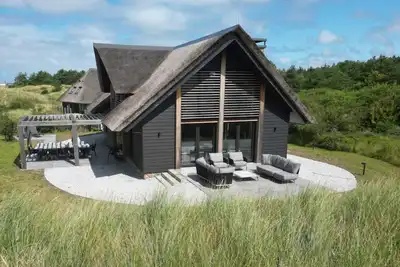 Image de Luxury villa Sig Ward with pool, sauna, spacious living room and beach 1 km away