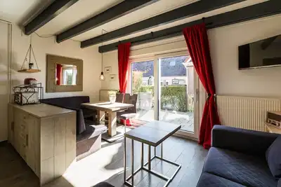 Image de Friese Antillen is a courtyard of 8 homes near of the beach and village Hollum.