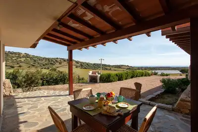 Image de Maison de vacances 'S'ena E Mammai' avec vue sur la mer, jardin, terrasse et Wi-Fi