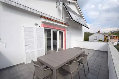 Image de Appartement de vacances avec air conditionné et balcon
