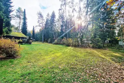 Image de Bungalow directly at the lake, with own boat