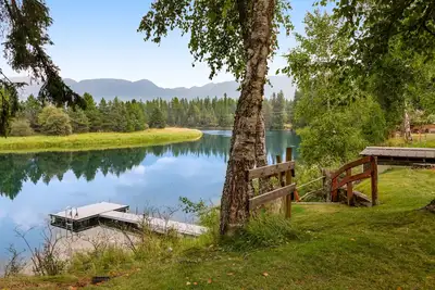 Image de Riverfront home with private dock, kayaks, 150+ ft Swan River frontage - dogs Ok