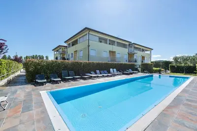 Image de Appartement 'Casetta Giù Al Lago' avec piscine partagée, Wi-Fi et climatisation