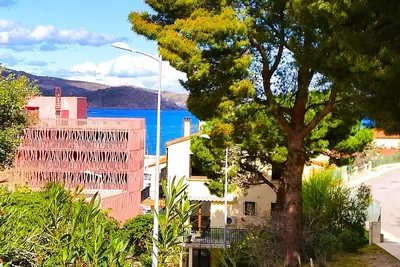 Image de Maison climatisée vue mer, à 2min à pied, parking privé, wifi 130M² de terrasses