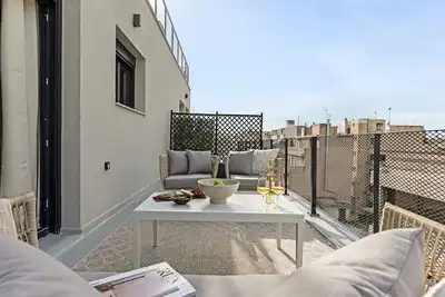 Image de Sanders Port - Studio audacieux avec terrasse sur le toit