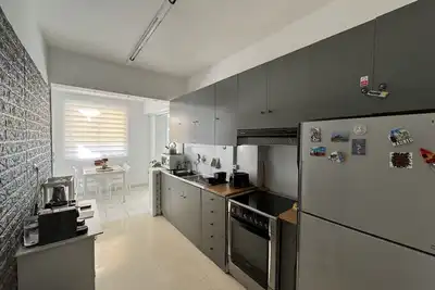 Image de A cozy apartment in the heart of Vouliagmeni city, 20min walk for the beach.