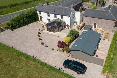 Image de A cottage that sleeps 12 guests in 6 bedrooms