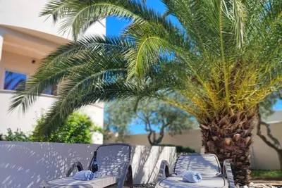 Image de Villa Maya, dva apartmaja v isti etaži z bazenom in bližino plaže