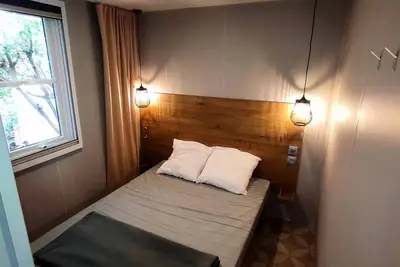 Image de Mobil-home Premium 30m² (2ch) + terrasse couverte + Clim + Tv + Lv + linge de maison 4 personnes