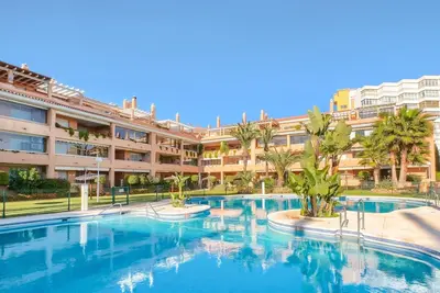 Image de Siesta Beach avec plage, belle terrasse et parking