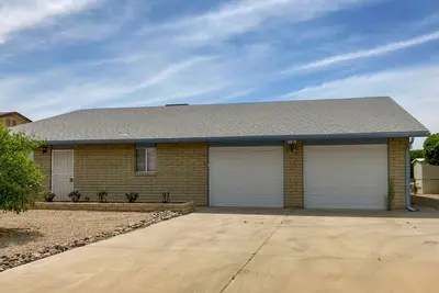 Spacious updated home in great location with enclosed backyard, patio, Ac