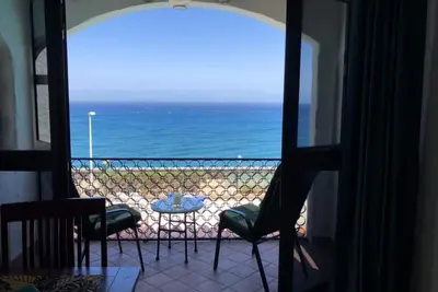 Image de Maison de vacances 'Vue panoramique sur l'océan' avec piscine partagée, Wi-Fi et climatisation