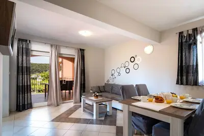 Image de Comfortable one-room apartment with a large terrace. A/C, Wi-Fi, Sat-Tv