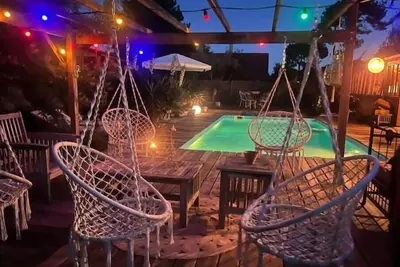Maison bois  bassin d'arcachon piscine jacuzzi 8 personnes