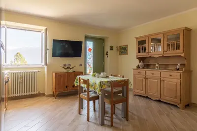 Image de Appartement \"El Pià\" avec vue sur le lac et jardin privé