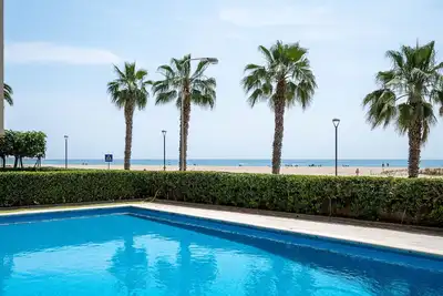 Image de Appartement face à la mer avec piscine, jardin et parking à Torredembarra