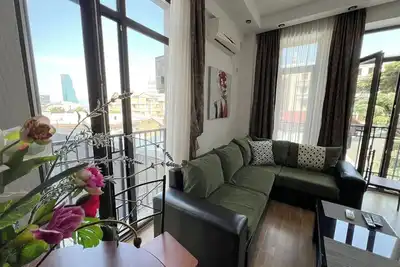 Image de Cozy apartment near the metro Liberty Square