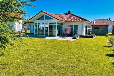 Image de Ferienhaus Windrose - Modernes Haus mit Kamin und Eigener Sauna Sowie Garten - Ferienhaus Windrose