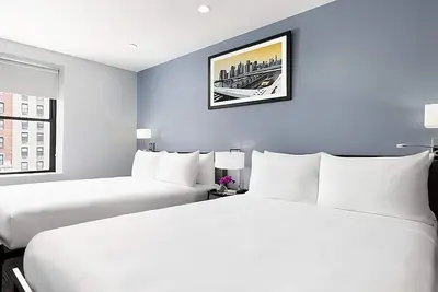 Image de Deluxe Two Queen Beds Room at Oyo Hotel Times Square