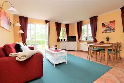 Image de Ferienwohnung mit SĂĽdterrasse Direkt am Hafen von Wustrow