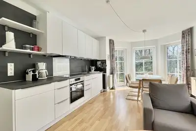 Image de Die GemĂĽtliche Ferienwohnung Edes Huus Liegt Ruhig im GrĂĽnen am Langeooger Ort