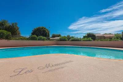 Image de Confortable appartement avec climatisation, Wifi, piscine, Tv, terrasse, animaux admis et parking