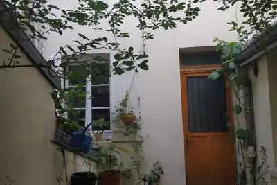 Image de Pleasant townhouse, 6 minutes from La Défense and 10 minutes from Paris.