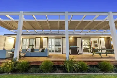 Image de Soothed by the sights and sounds of the sea, the Quirky Black Shack beckons!
