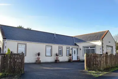 Image de 4 chambres à coucher à Sandyhills
