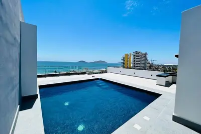Image de Hermoso departamento moderno a 50 pasos de la playa!