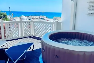 Image de Beach front Villa with hot tub, just steps from the sea