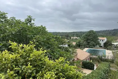 Image de Villa 'Le Petit Mauricia' avec vue sur les montagnes, terrasse, piscine partagée et Wi-Fi