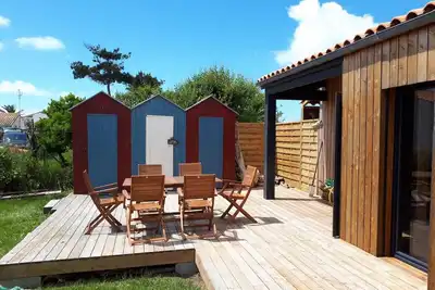 Image de Maison style cabane derrière la dune