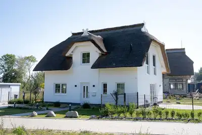 Image de Ferienhaus Hus in de Sünn in der Puddeminer Wiek - Ferienhaus Hus in de Sünn