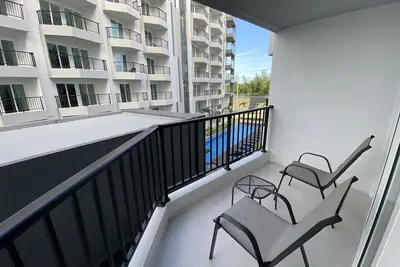 Image de One bedroom condo 2 pools with free Wi-Fi, only 2 mins to Mae Phim beach.