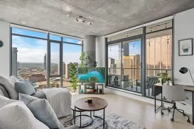 Image de Dt Views |King Bed |Mins to Saddledome |Ug Parking