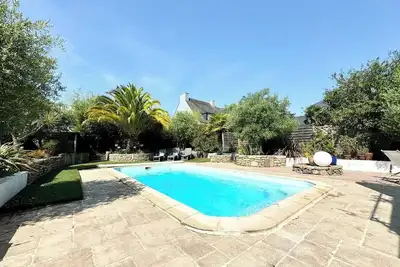 Image de Appartement T4 tout neuf avec jardin & piscine à Larmor plage face mer