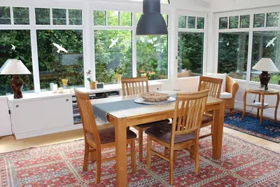 Image de Ferienwohnung Wintergarten - Ferienhaus \"Am Deich 30\"