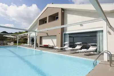 Image de Villa à Poggio Del Sole avec 5 chambres à coucher, 11 couchages