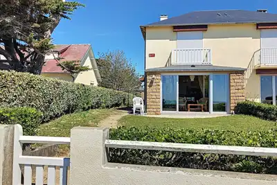 Image de Appartement avec balcon, jardin, et accès plage