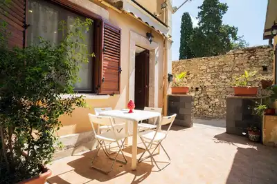 Image de Maison de vacances 'Carly Taormina' avec terrasse partagée et Wi-Fi