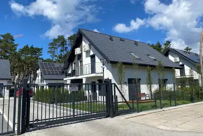 Image de Maison de vacances Dziwnów pour 1 - 5 personnes avec 2 chambres à coucher - Maison de vacances