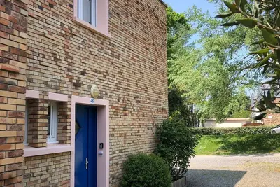 Image de Duplex avec terrasse dans parc boisé à 500 m de la plage