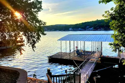 Image de Lakefront pet-friendly home/private dock with boat slip and two place Pwc lift.