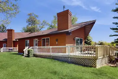 Image de Lakefront retreat with panoramic views, large backyard, & direct beach access