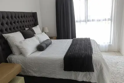Enjoy a one bedroom ensuite with an open plan lounge and kitchen
