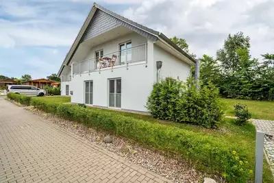 Image de Maison de vacances 'Ferienhaus Seeglück2 Am Tollensesee' avec vue sur lac, terrasse privée et Wi-Fi
