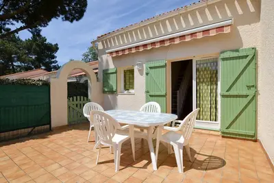 Image de Maison T3 Bis à La Palmyre - Proche Mer et Commerces - Terrasse et Parking Privé - Tout Confort